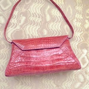 Nancy Gonzalez small salmon colored bad